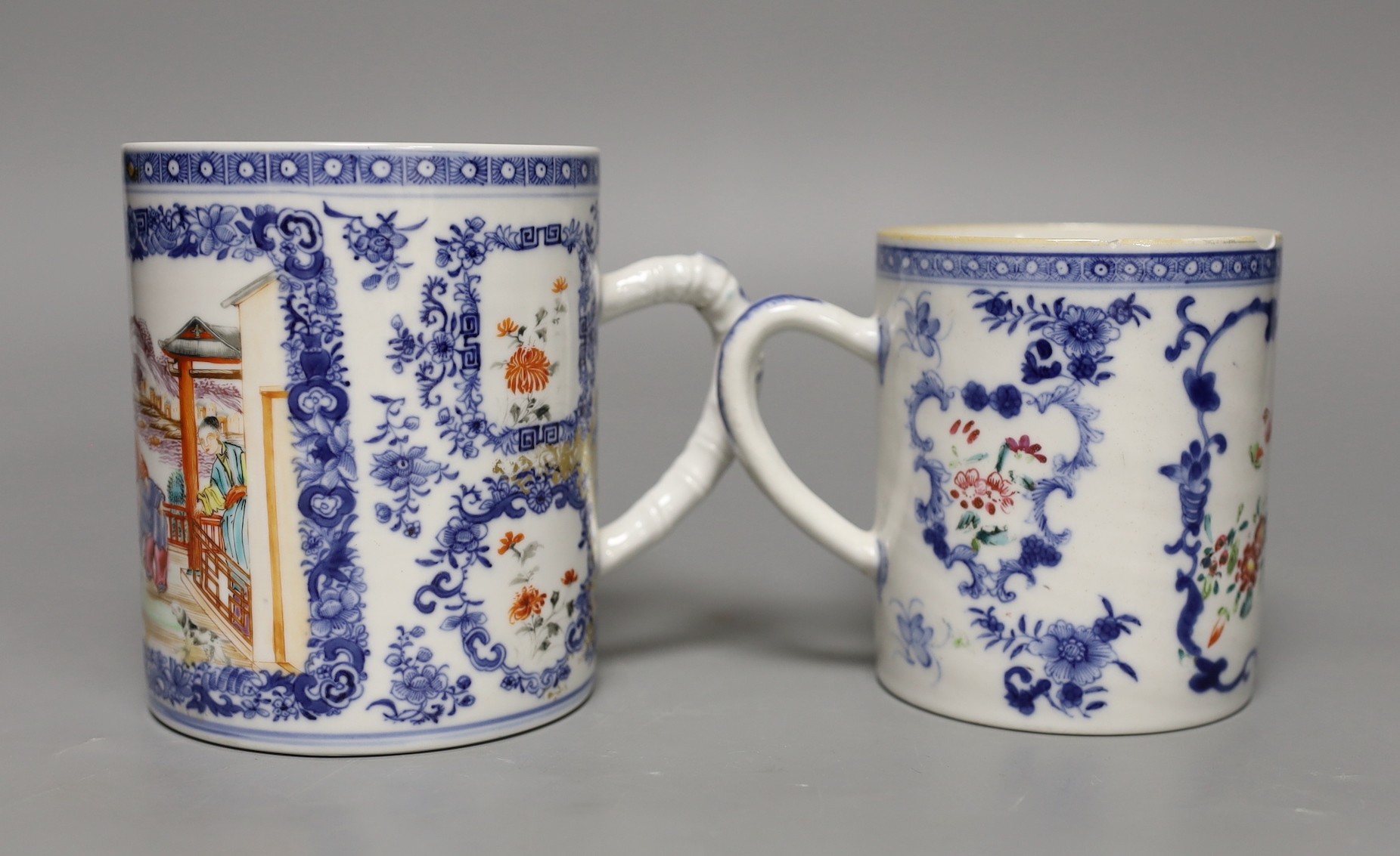 Two late 18th century Chinese exports famille rose mugs, tallest 12cm (2)